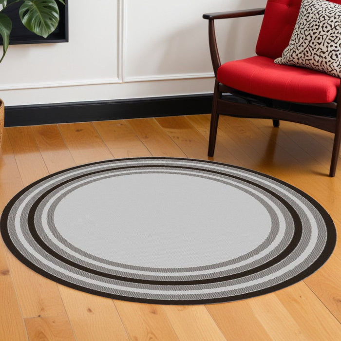 8' Machine Woven UV Treated Bordered Indoor / Outdoor Round Area Rug - Gray