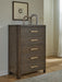 Radkin - Five Drawer Chest - Burnished Brown Signature Design by Ashley®