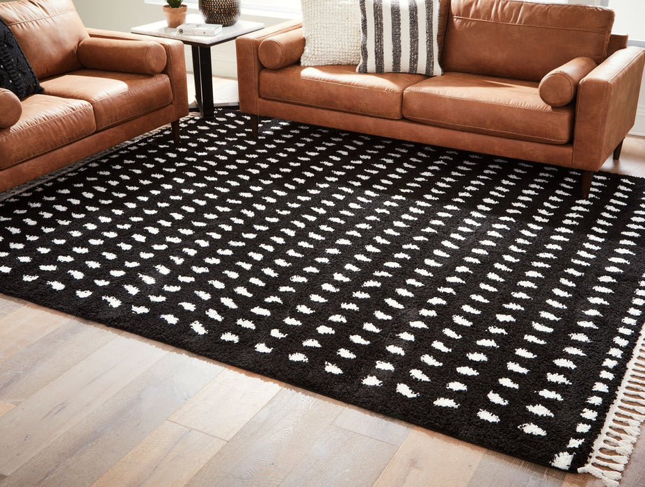 Minston - 5' x 7' Rug - Black / White Signature Design by Ashley®