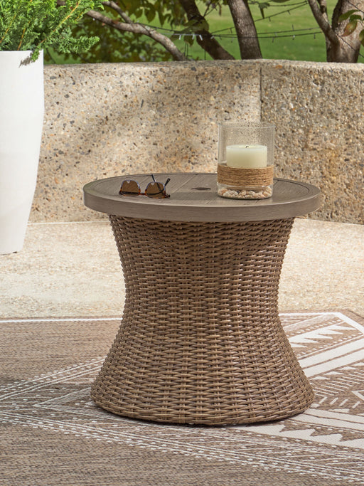 Laguna Heights - Round End Table With Umbrella Option - Beige Signature Design by Ashley®