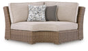 Laguna Heights - Curved Corner Chair With Cushion - Beige Signature Design by Ashley®