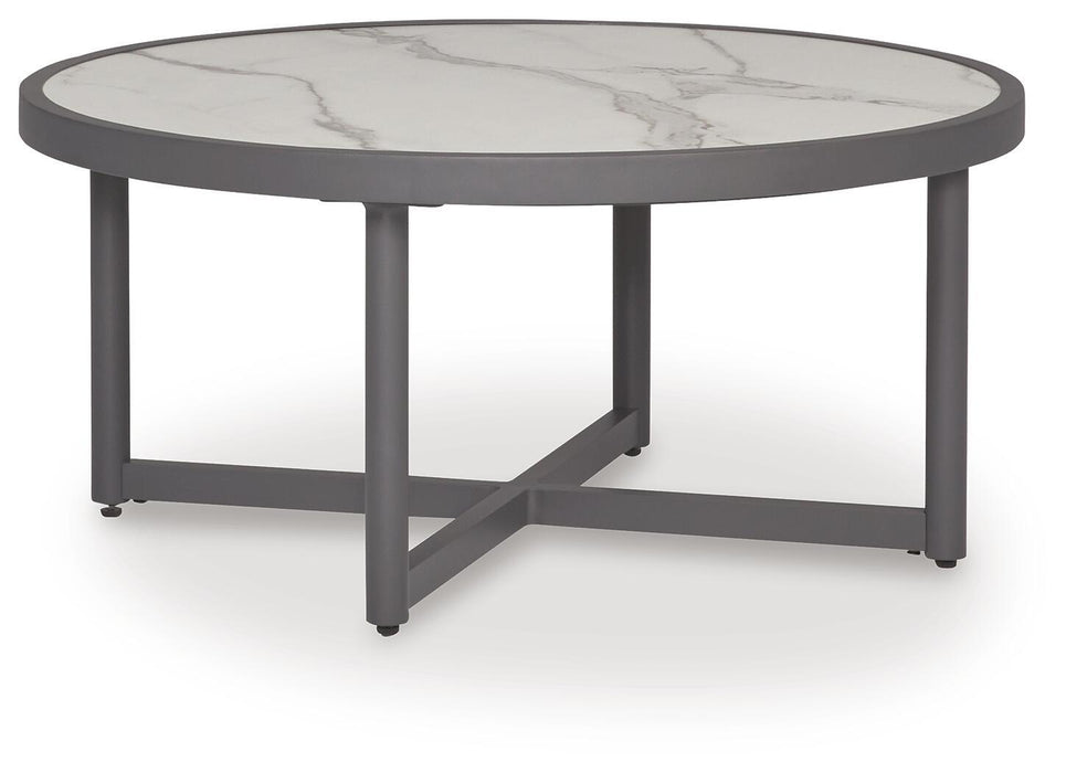 Ocean Beach - Round Table Signature Design by Ashley®