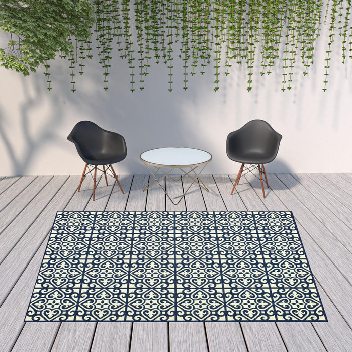 8' X 11' Geometric Stain Resistant Indoor Outdoor Area Rug - Ivory / Blue