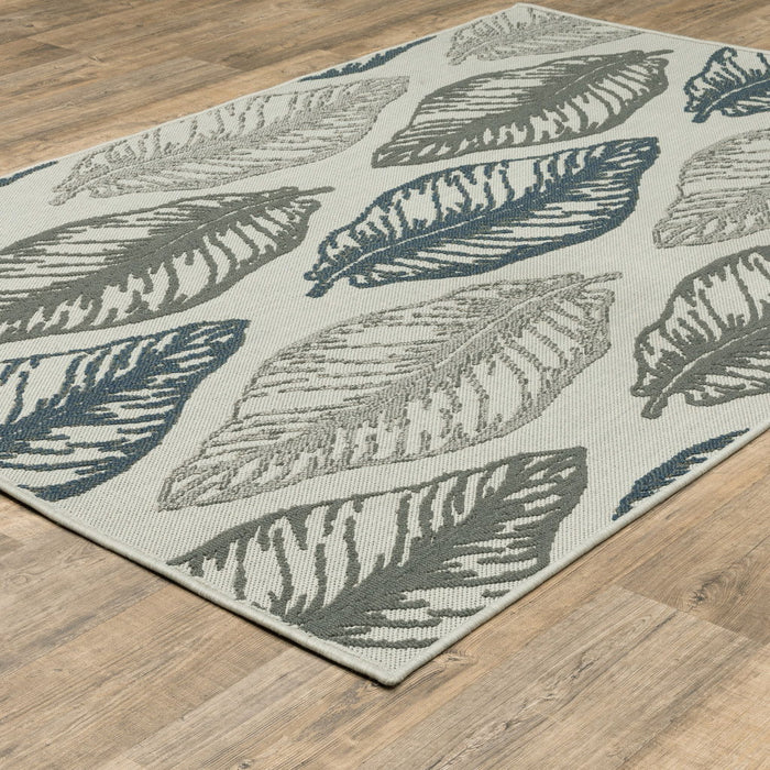 7' X 9' Floral Stain Resistant Indoor / Outdoor Area Rug - Beige