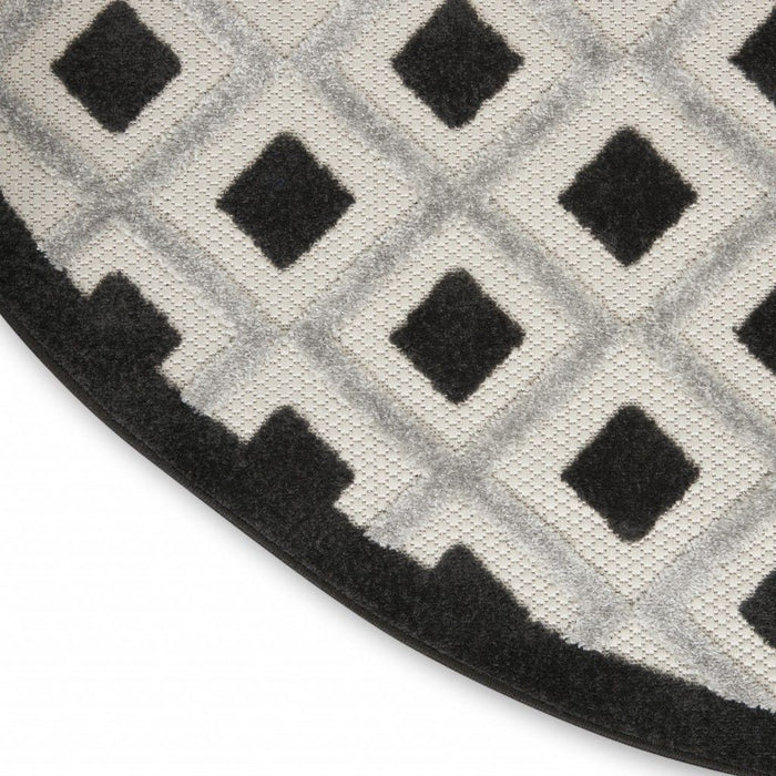 4' Round Round Geometric Indoor / Outdoor Area Rug - Black / White