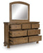 Feddinger - 5 Pc. - Queen Sleigh Storage Bed, Dresser, Mirror, Chest And Nightstand - Medium Brown Signature Design by Ashley®