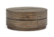 Baisden - Round Lift Top Cocktail Table With Casters - Tobacco Magnussen Furniture