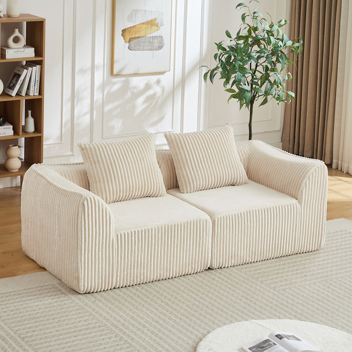 Minimalist Sofa With Curved Lines And Horn Shaped Throw Pillows Home Essentials