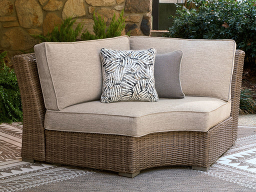 Laguna Heights - Curved Corner Chair With Cushion - Beige Signature Design by Ashley®