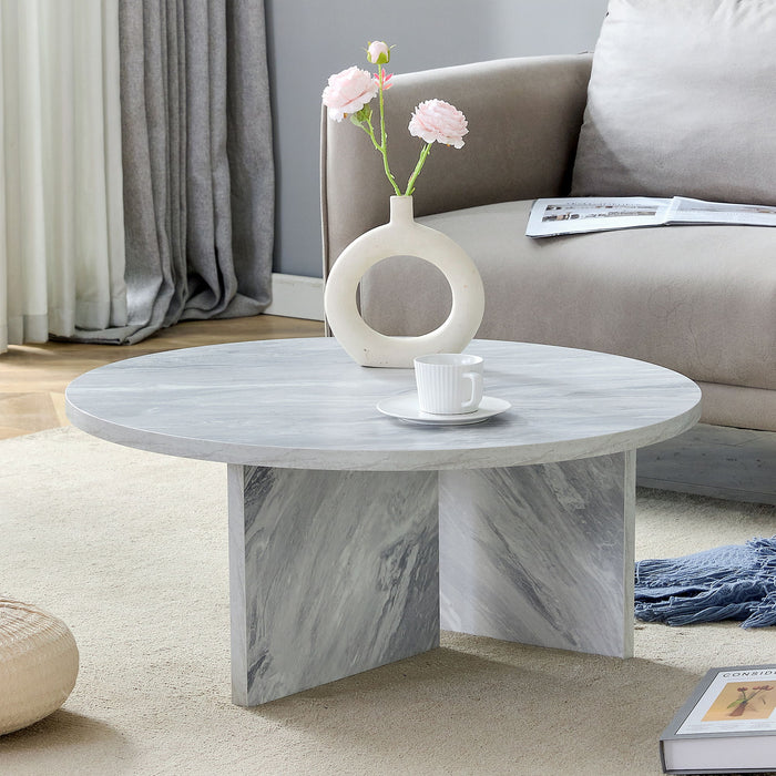 Versatile Round Coffee Table For Various Interior Styles