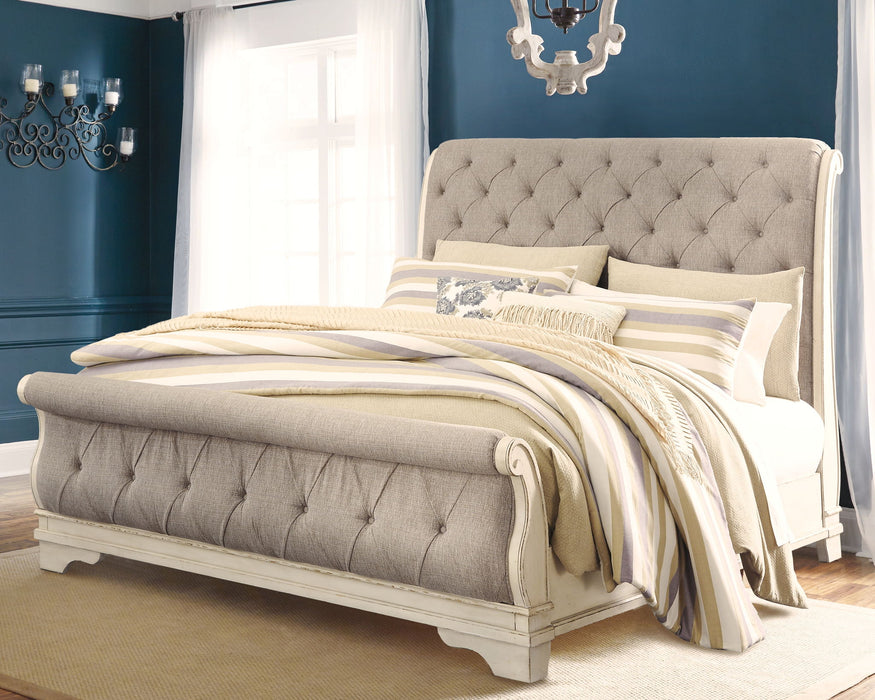 Realyn - Upholstered Sleigh Bed Signature Design by Ashley®