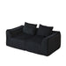 Minimalist Sofa With Curved Lines And Horn Shaped Throw Pillows Home Essentials