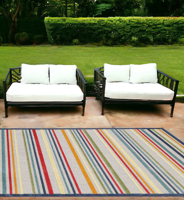 7' X 9' Striped Stain Resistant Indoor / Outdoor Area Rug - Ivory / Blue