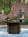 Monterey Point - Round Fire Pit Table - Dark Brown Signature Design by Ashley®