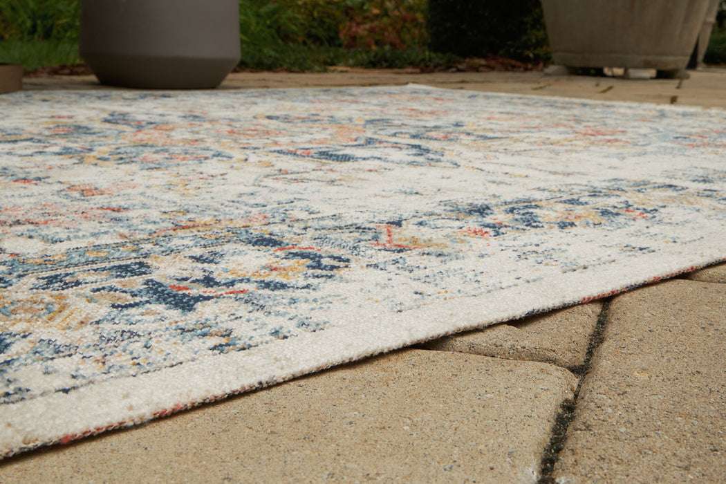 Jarrpage - Indoor/Outdoor 5' x 7' Rug - Multi Signature Design by Ashley®