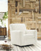 Herstow - Swivel Glider Accent Chair - Ivory Signature Design by Ashley®