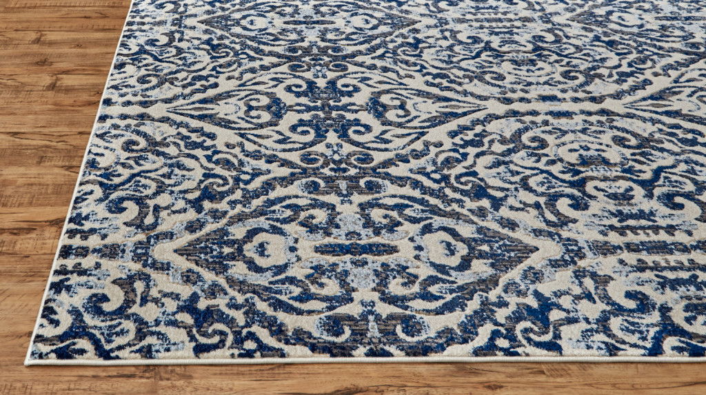 Floral Distressed Stain Resistant Runner Rug - Blue Ivory And Black - 8'