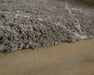 Wrenlow - Area Rug Signature Design by Ashley®
