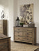Trinell - Six Drawer Dresser - 61.34" x 15.98" x 42.99" - Brown Dark Signature Design by Ashley®