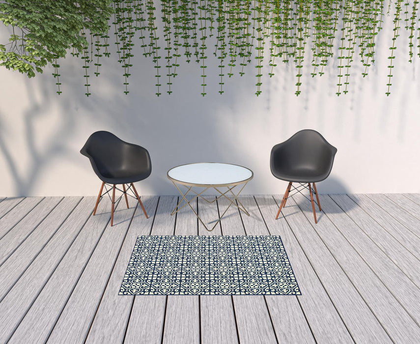 4' X 6' Geometric Stain Resistant Indoor / Outdoor Area Rug - Ivory / Blue