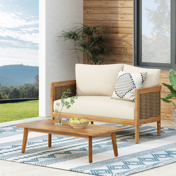 Outdoor Seating Group With Cushions And Coffee Table