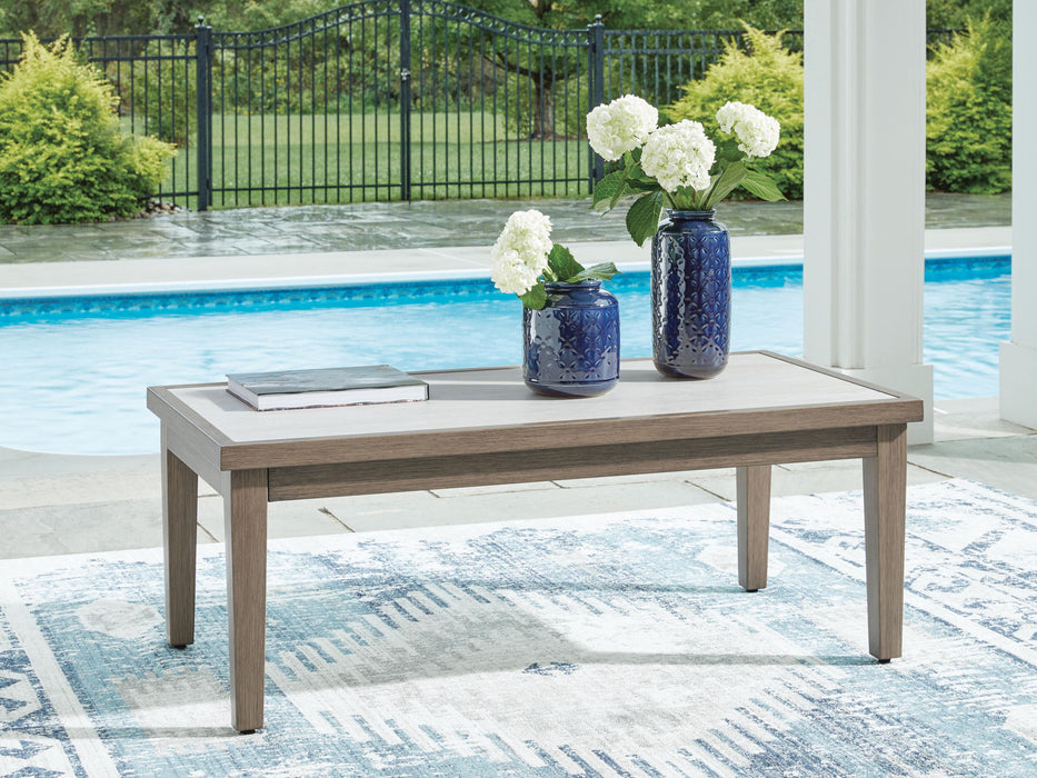 Rainier Ranch - Rectangular Cocktail Table - Brown / Beige Signature Design by Ashley®