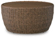 Double Point - Round Cocktail Table - Beige Signature Design by Ashley®