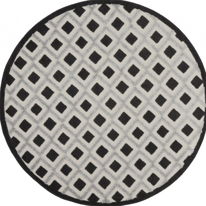 4' Round Round Geometric Indoor / Outdoor Area Rug - Black / White