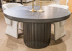 Haldenwick - Round Dining Room Table - Black Signature Design by Ashley®