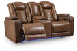 Gruaro - Power Reclining Loveseat With Console / Adjustable Headrest - Amber Signature Design by Ashley®