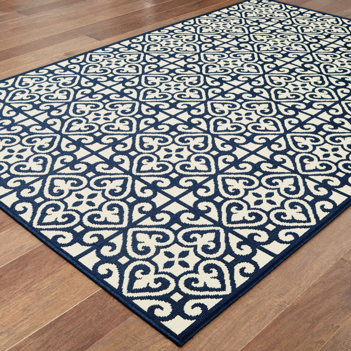 5' X 8' Geometric Stain Resistant Indoor / Outdoor Area Rug - Ivory / Blue