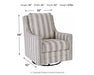 Kambria - Swivel Glider Accent Chair - Ivory / Black Signature Design by Ashley®