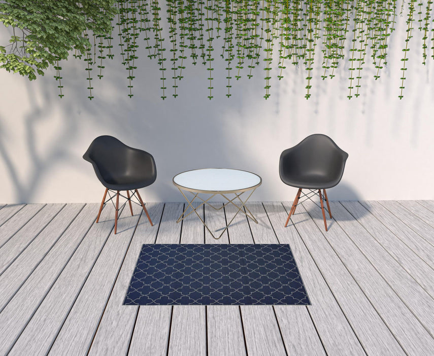 4' X 6' Geometric Stain Resistant Outdoor / Indoor Area Rug - Blue / Ivory