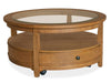 Durant - Round Cocktail Table With Casters - Honey Brown Magnussen Furniture