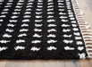 Minston - 5' x 7' Rug - Black / White Signature Design by Ashley®