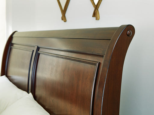 Trellington - Queen Sleigh Storage Bed - Brown Signature Design by Ashley®