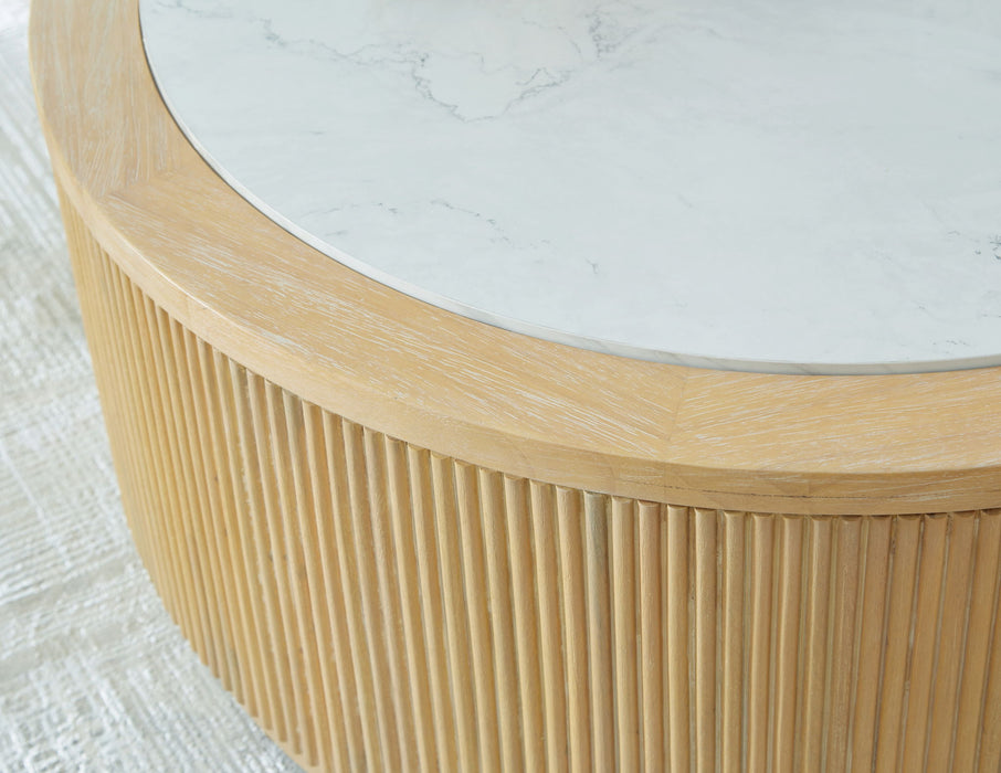 Camdill - Round Cocktail Table - Light Brown / White Signature Design by Ashley®
