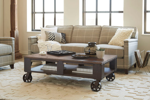 Pinebrook - Rectangular Cocktail Table (2 Braking Casters) - Distressed Natural Pine Magnussen Furniture