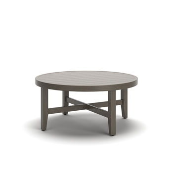 Point Sur - Round Cocktail Table - Beige / Brown Millennium® by Ashley