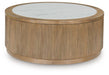 Camdill - Round Cocktail Table - Light Brown / White Signature Design by Ashley®