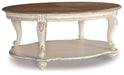 Realyn - Oval Cocktail Table - White / Brown Signature Design by Ashley®