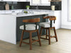 Ralene - Upholstered Swivel Barstool (Set of 2) - Medium Brown Signature Design by Ashley®