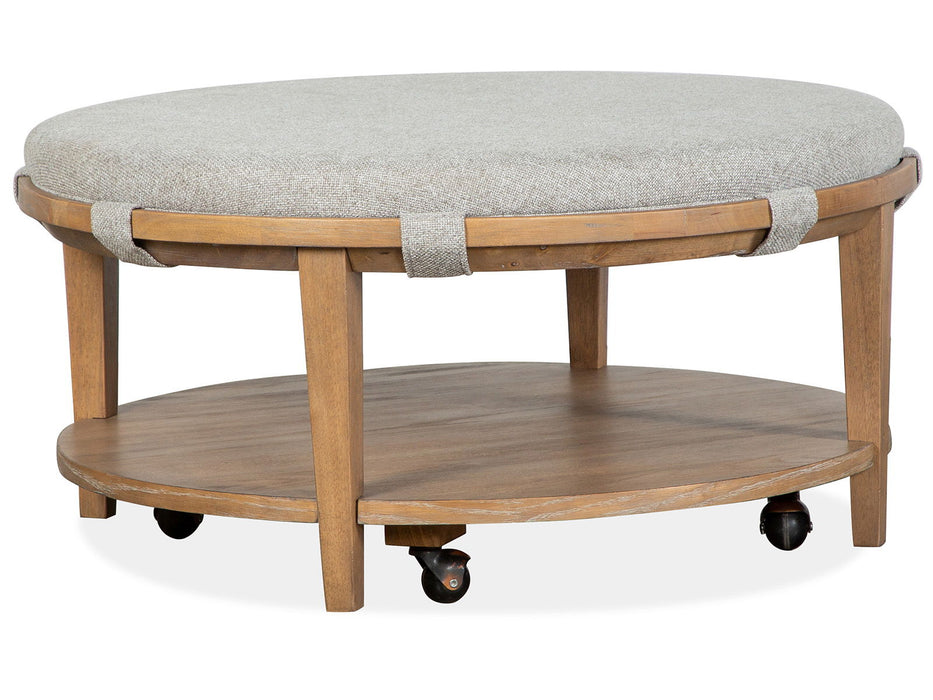 Lindon - Round Cocktail Table With Gray Upholstered Top & Casters - Belgian Wheat Magnussen Furniture