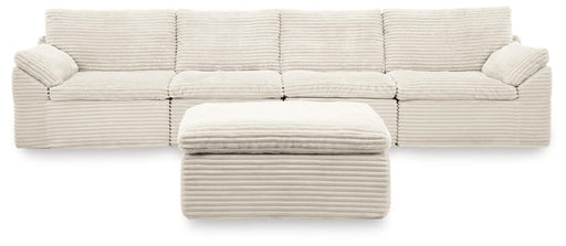 Fannin - 4-Piece Sectional With Ottoman - Ivory Signature Design by Ashley®