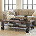Pinebrook - Rectangular Cocktail Table (2 Braking Casters) - Distressed Natural Pine Magnussen Furniture