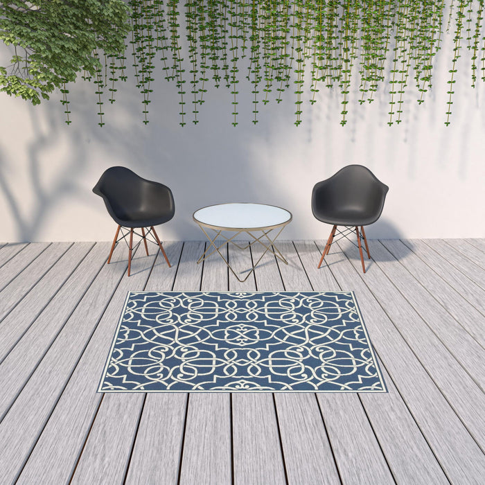 5' X 8' Geometric Stain Resistant Outdoor & Indoor Area Rug - Blue / Ivory