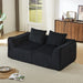 Minimalist Sofa With Curved Lines And Horn Shaped Throw Pillows Home Essentials