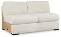 Chessington - Armless Loveseat - Ivory Signature Design by Ashley®
