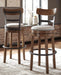 Valebeck - Tall Upholstered Swivel Barstool Signature Design by Ashley®