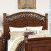 Bed With Ornate Carvings And Curved Headboard Home Essentials